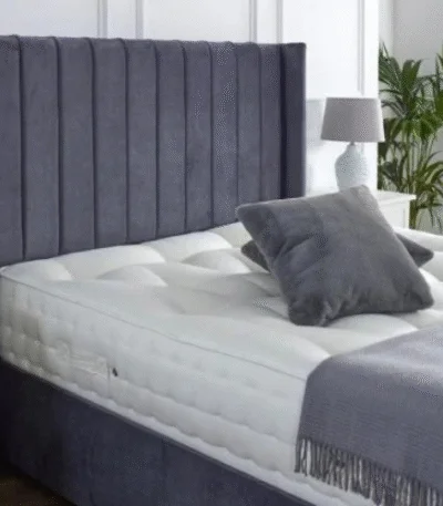 person sleeping comfortably on supportive mattress for back pain relief